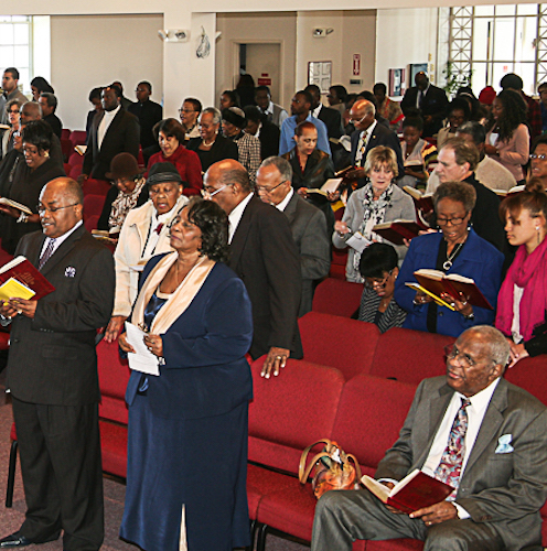 standing, listening to a sermon